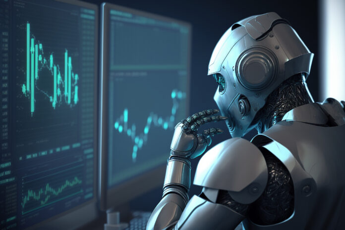 Roboter vor einem Bildschirm als Symbolfoto für Künstliche Intelligenz in der Geldanlage