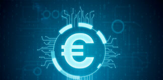 Hand holding tablet with glowing blue euro icon interface hud. Technology and money concept.