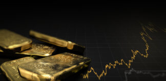 Symbobild für Gold: Goldbaren und ein steigender Kurs