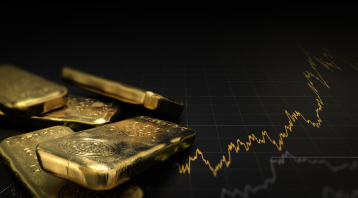 Symbobild für Gold: Goldbaren und ein steigender Kurs