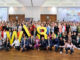 Gruppenfoto mit allen Teilnehmenden am Raiffeisen Bundeskongress Diversität & WIR 2025