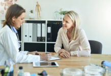 Shot of a female doctor discussing something with her patient