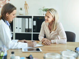 Shot of a female doctor discussing something with her patient