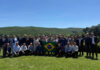 Sicredi meets Raiffeisen Gruppenfoto mit Brasilien-Flage
