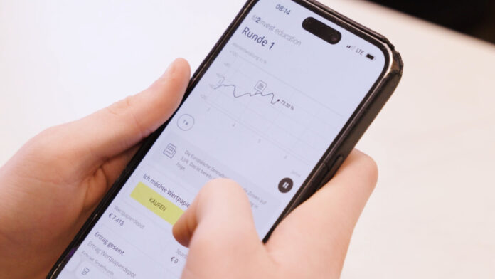 Blick auf ein Smartphon emit fit2invest geöffnet