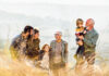 Ablebensversicherung: Für den Fall der Fälle Happy multi-generation family talking while taking a walk on the field. Copy space.
